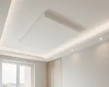 Soffitto moderno con controsoffitto in cartongesso, illuminazione a LED integrata e un pannello centrale sospeso.