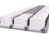 Sezione di un solaio in calcestruzzo armato precompresso con elementi prefabbricati in polistirene e armature metalliche.