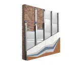 Sezione di un muro con isolamento termico e rivestimento esterno, illustra un intervento di efficientamento energetico.