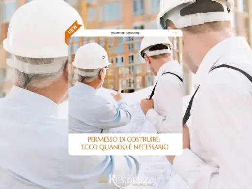 Ingegneri con caschi bianchi esaminano un progetto edilizio. Il testo indica "Permesso di costruire: ecco quando è necessario".