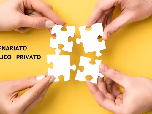 Mani che uniscono pezzi di puzzle, simboleggiando il **partenariato pubblico privato** per creare un futuro collaborativo.